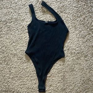 All black body suit